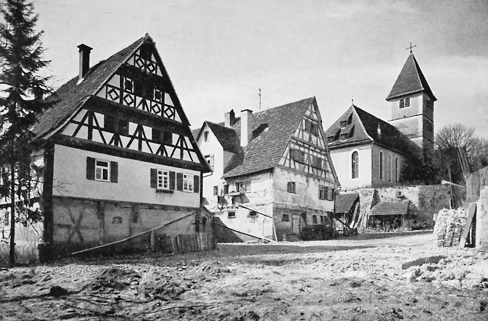 Blick auf Häuser und Kirche in Darmsheim um 1908